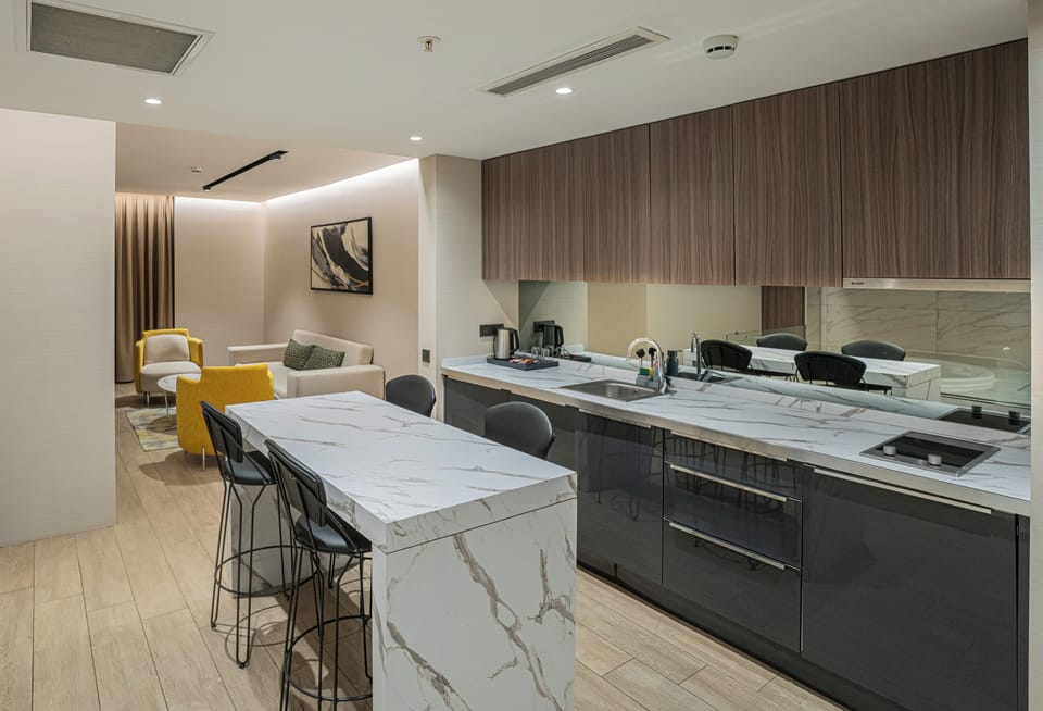 Luxury Suite | Premium bedding, in-room safe, soundproofing, iron/ironing board
