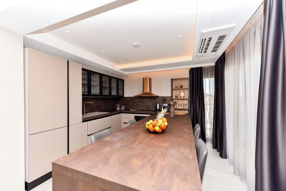 Exclusive Villa | Private kitchen | Stovetop, coffee/tea maker, electric kettle, highchair