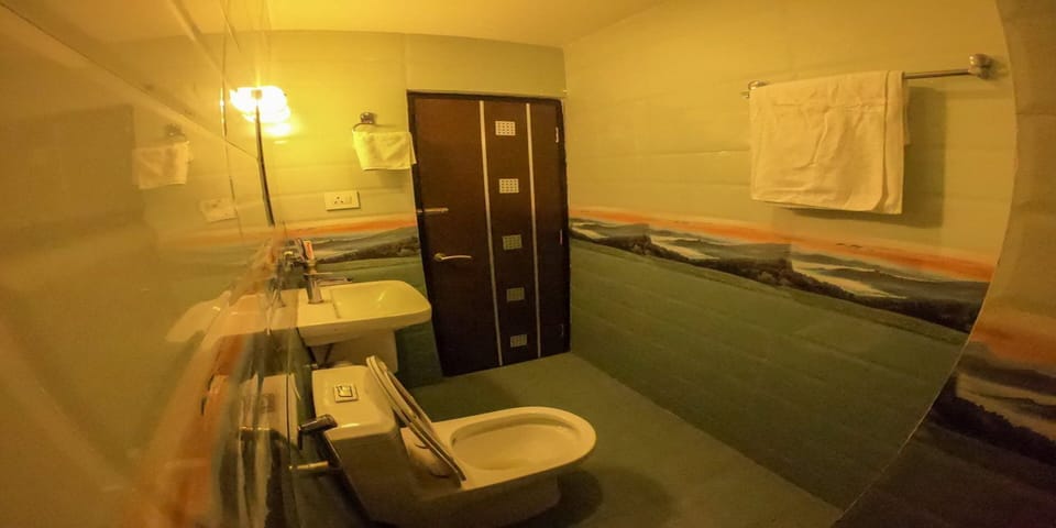 Shower, rainfall showerhead, towels, soap