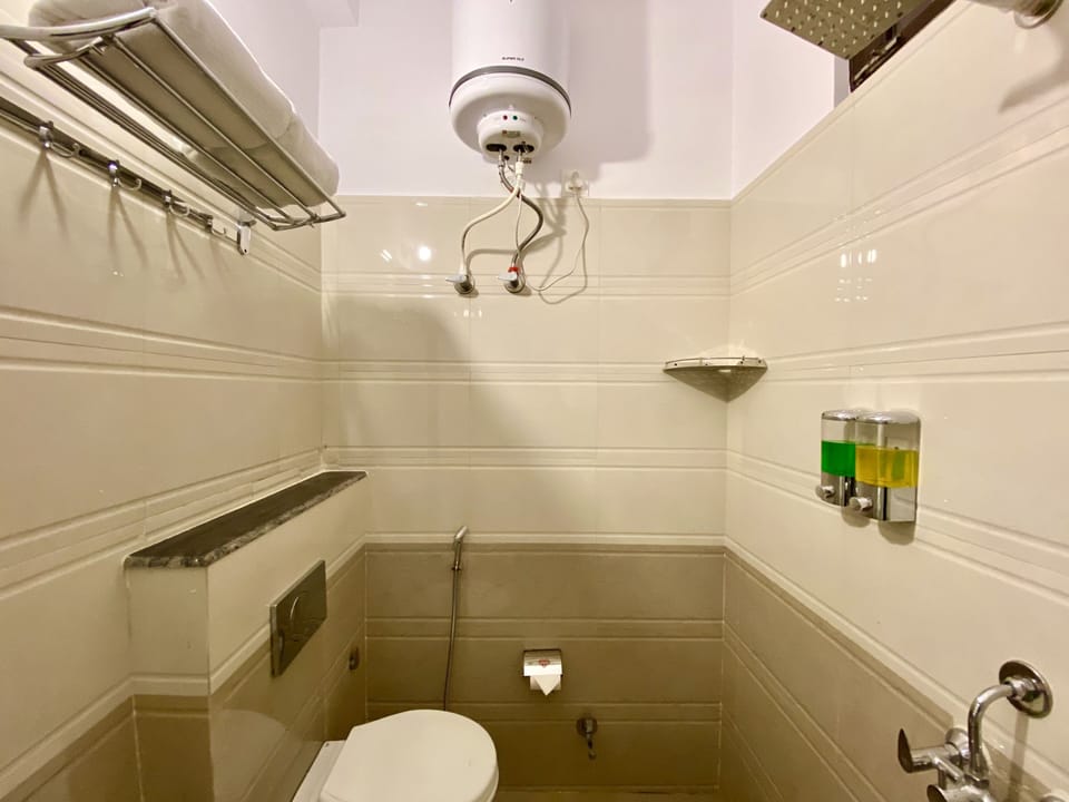 Shower, free toiletries, hair dryer, slippers