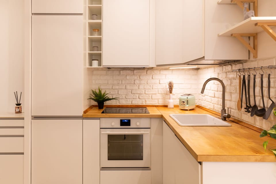 Comfort Apartment | Private kitchen | Full-size fridge, oven, stovetop, dishwasher