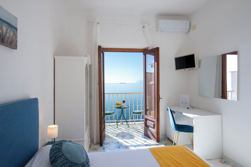 Superior Double Room, Sea View | Minibar, desk, travel crib, free WiFi