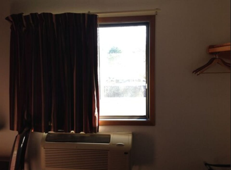 Desk, blackout drapes, iron/ironing board, free WiFi