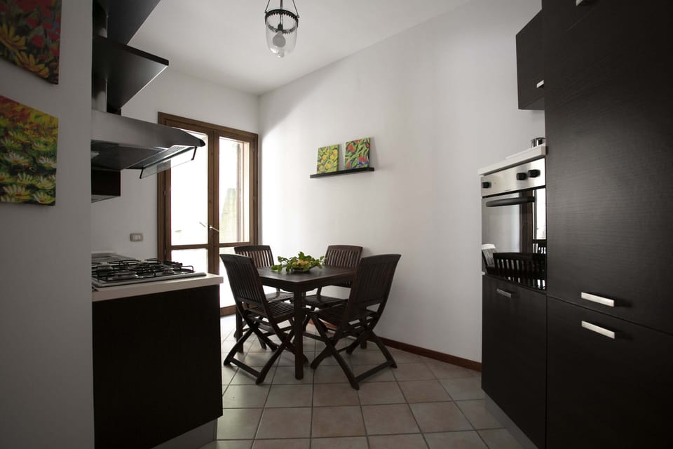 Traditional Villa | Private kitchen | Fridge, oven, stovetop, highchair