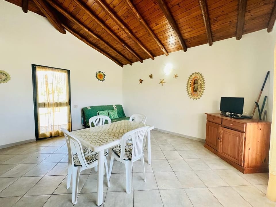 Apartment | Living area | 22-inch flat-screen TV with cable channels