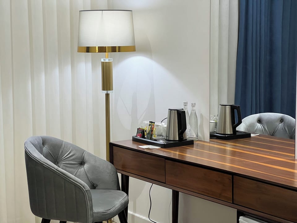 Premium bedding, down comforters, pillowtop beds, minibar