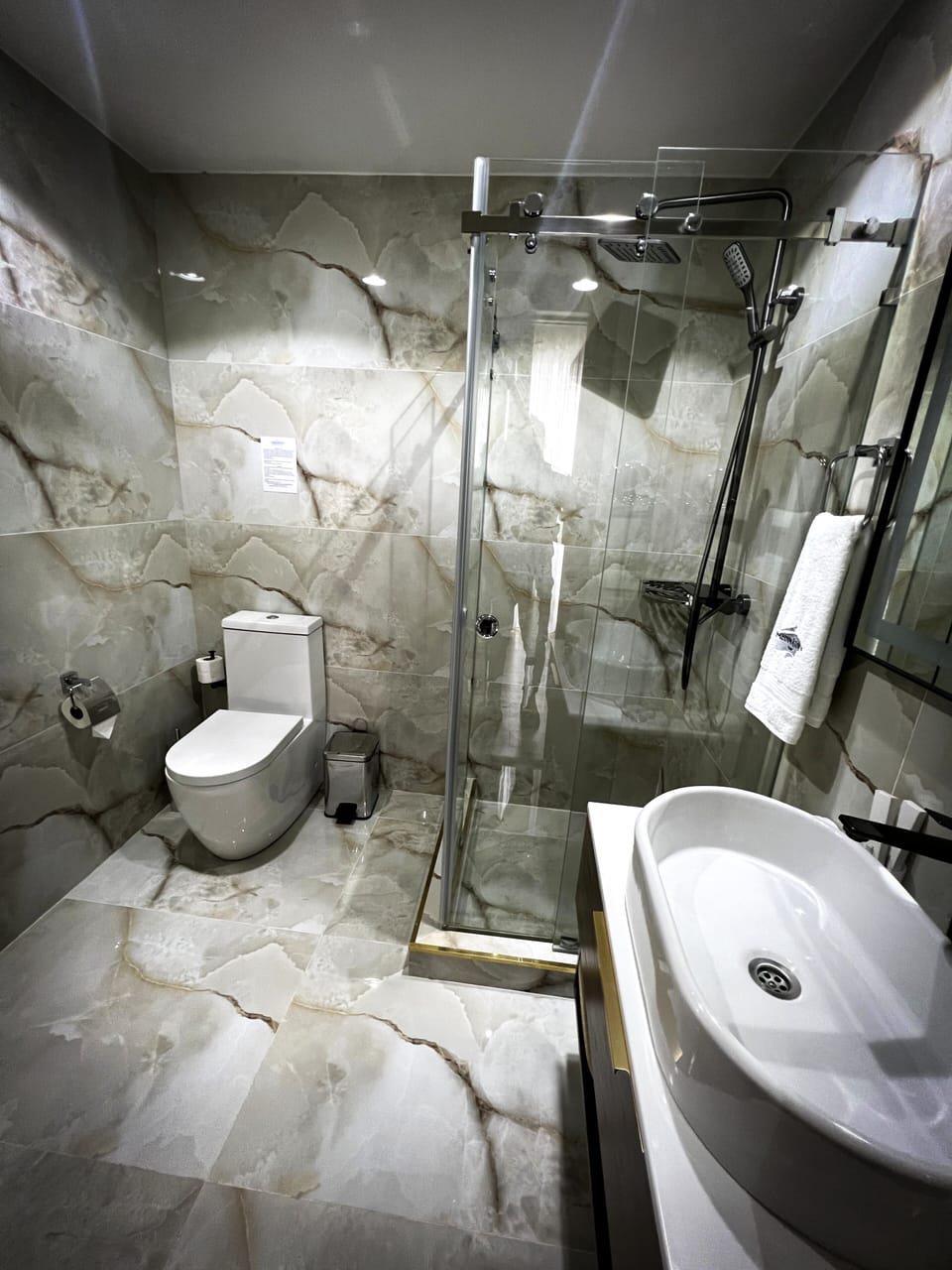 Shower, hydromassage showerhead, hair dryer, bathrobes