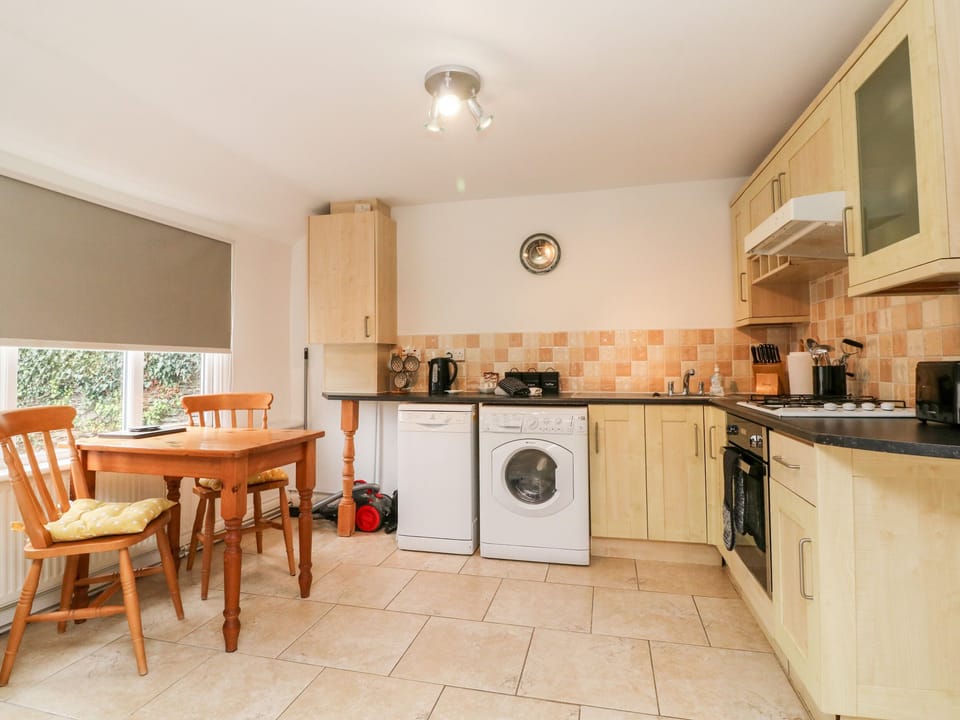 Fridge, electric kettle, toaster, cookware/dishes/utensils