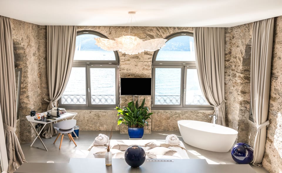 Prestige Suite, Lake View | Hypo-allergenic bedding, down comforters, minibar, in-room safe