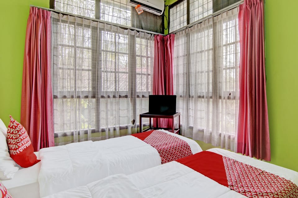 Desk, laptop workspace, bed sheets