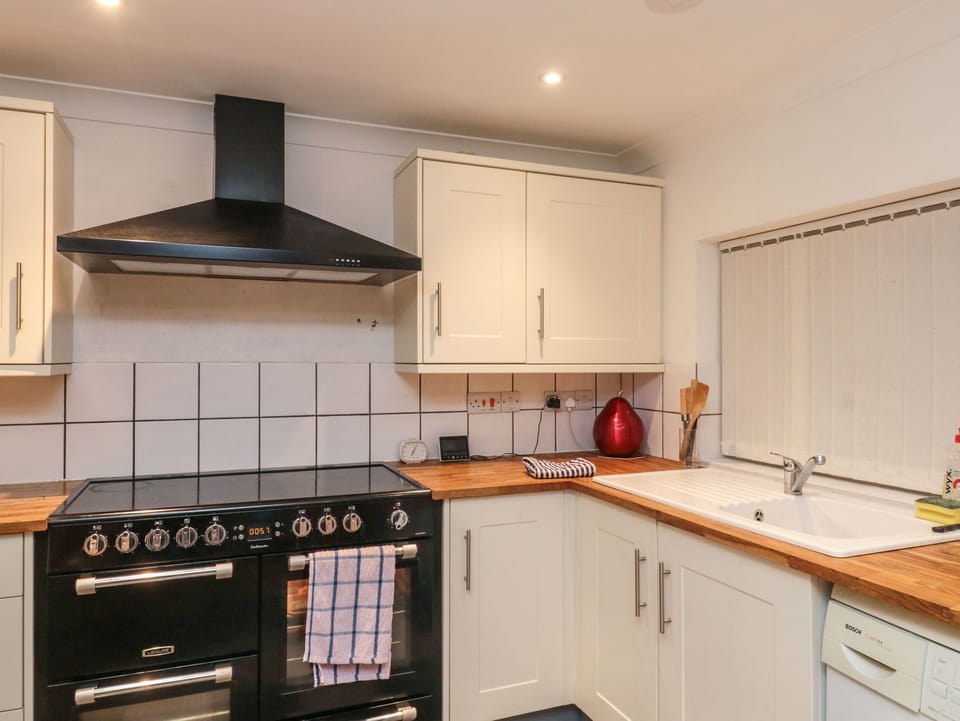 Fridge, electric kettle, toaster, cookware/dishes/utensils