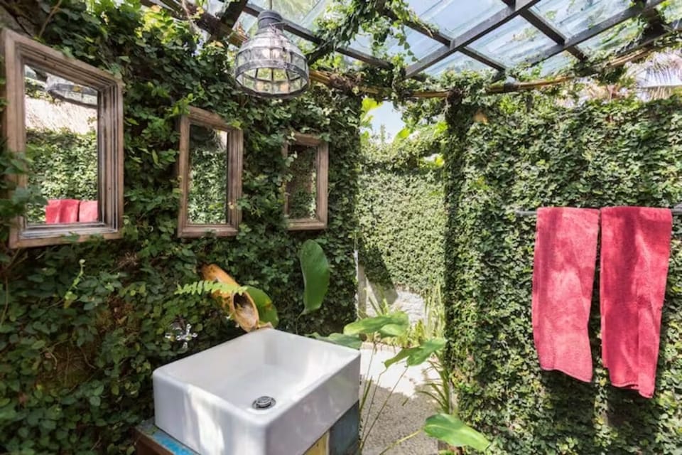 Bamboo Eco Cottage | Bathroom | Hair dryer, towels
