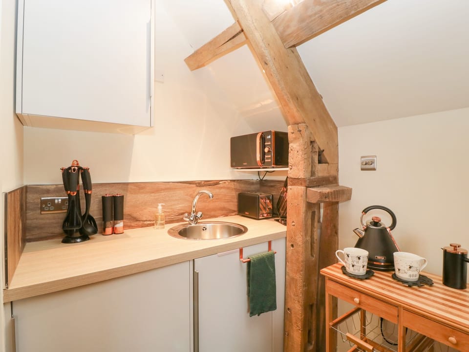 Fridge, electric kettle, toaster, cookware/dishes/utensils