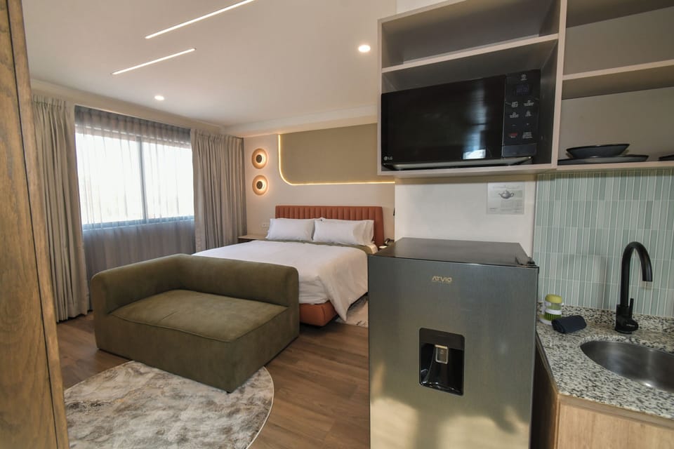 Junior Suite | In-room safe, desk, laptop workspace, blackout drapes