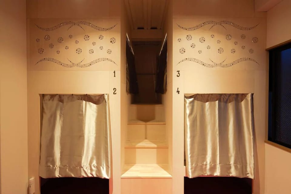Family Quadruple Room, 4 Bedrooms | In-room safe, laptop workspace, blackout drapes, iron/ironing board