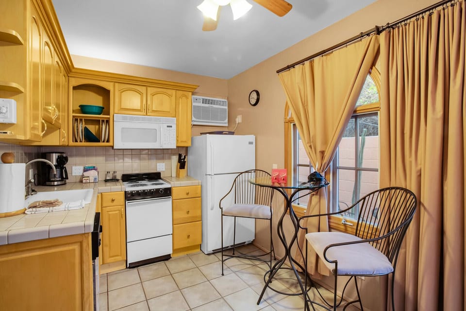 Garden Studio, 1 King, Kitchenette, Fireplace | Private kitchen | Coffee/tea maker, fridge, microwave, toaster