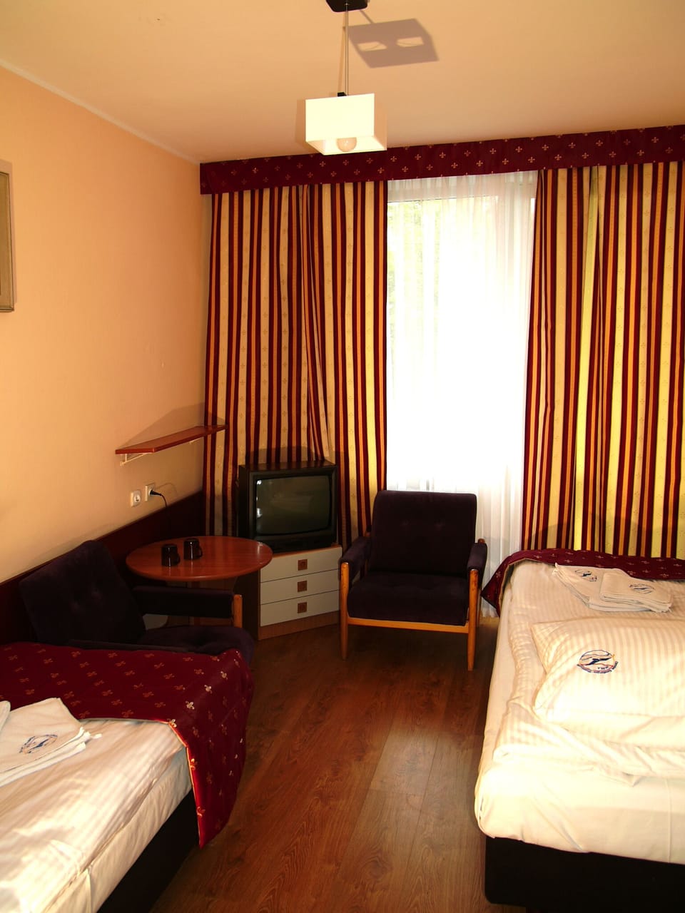 Iron/ironing board (on request), WiFi (free), bed sheets
