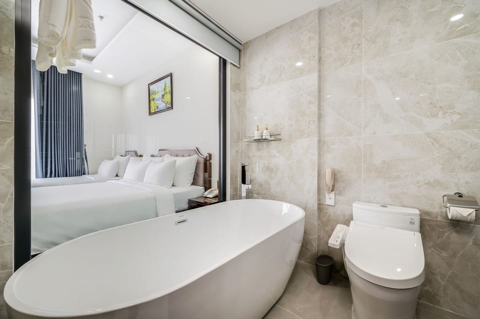 Studio, Multiple Beds, Balcony | Bathroom | Designer toiletries, hair dryer, bathrobes, slippers