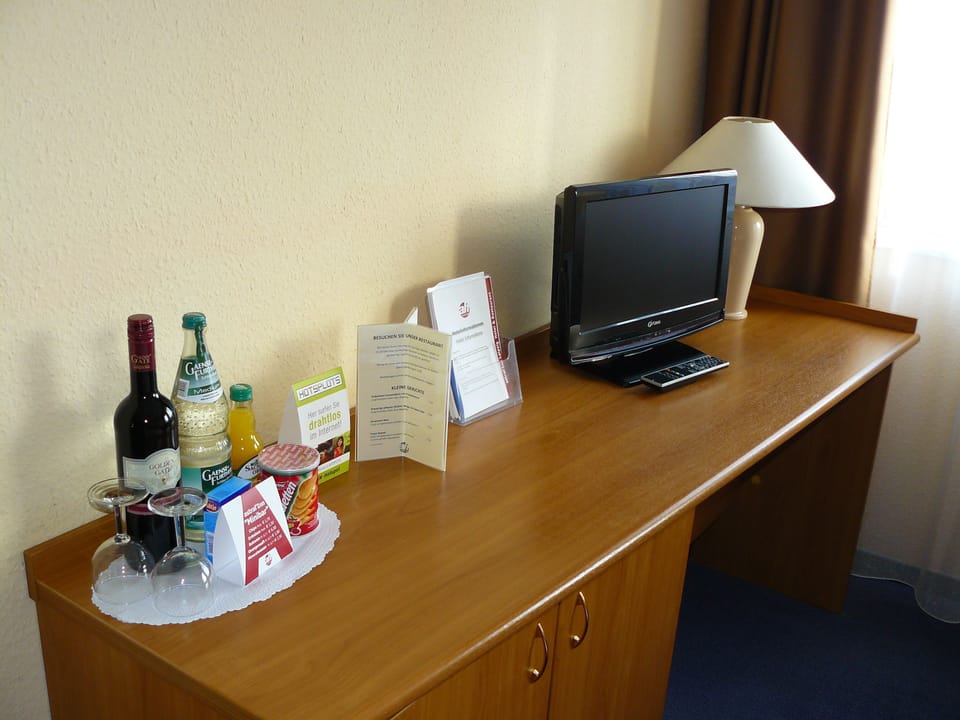 Desk, blackout drapes, iron/ironing board (on request), WiFi (free)