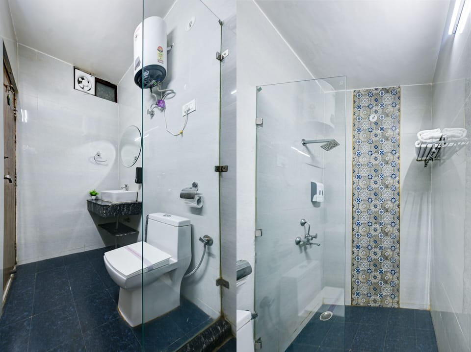 Deluxe Double or Twin Room | Bathroom | Shower, designer toiletries, hair dryer, slippers
