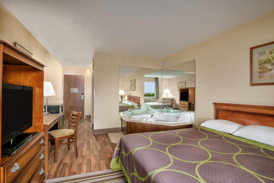 Room, 1 King Bed, Non Smoking | Desk, blackout drapes, iron/ironing board, free cribs/infant beds