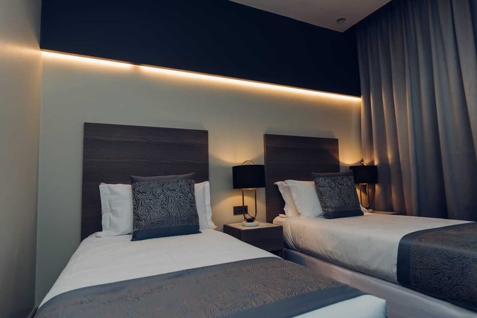 Apartment | Minibar, in-room safe, blackout drapes, soundproofing