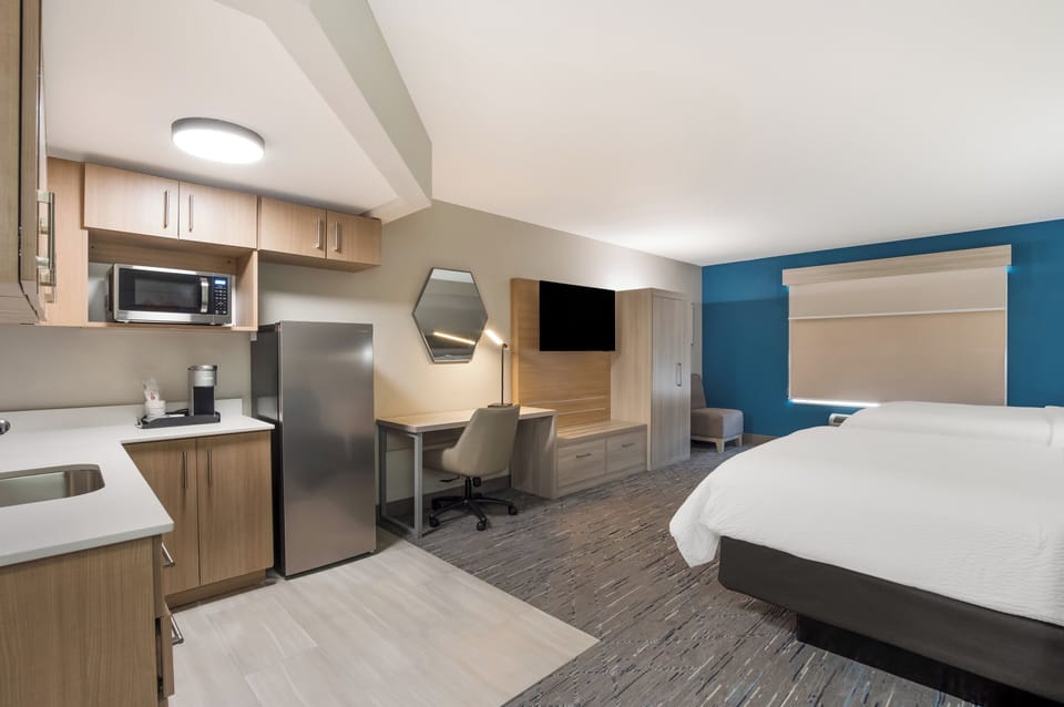 Suite, 2 Queen Beds, Accessible (Communications) | In-room safe, desk, laptop workspace, blackout drapes
