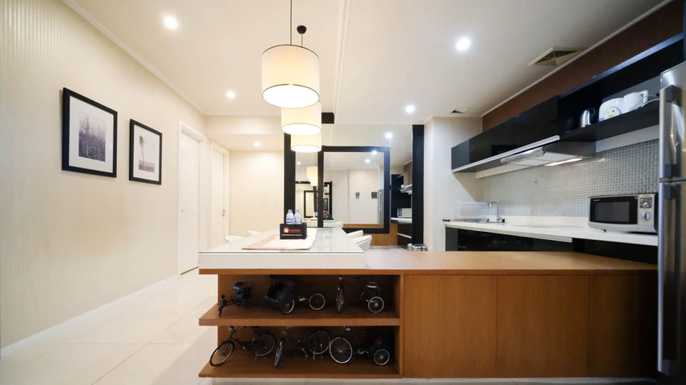 Apartment | Private kitchen | Full-size fridge, stovetop