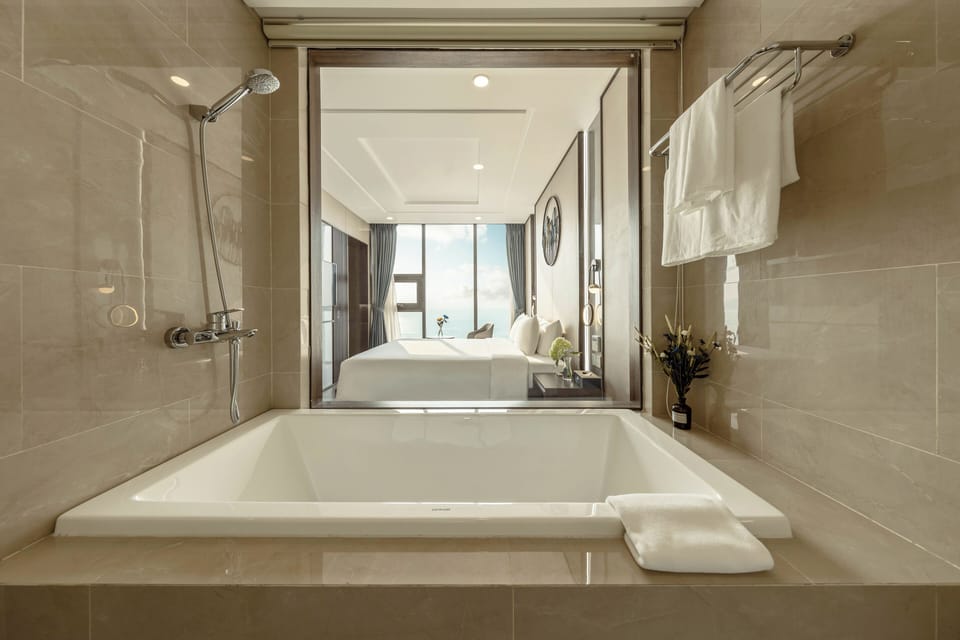 Grand Studio Suite, 1 King Bed, Non Smoking, Ocean View | Bathroom | Hair dryer, bathrobes, slippers, bidet
