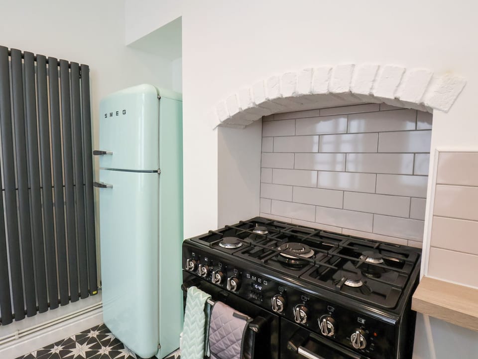 Fridge, electric kettle, toaster, cookware/dishes/utensils