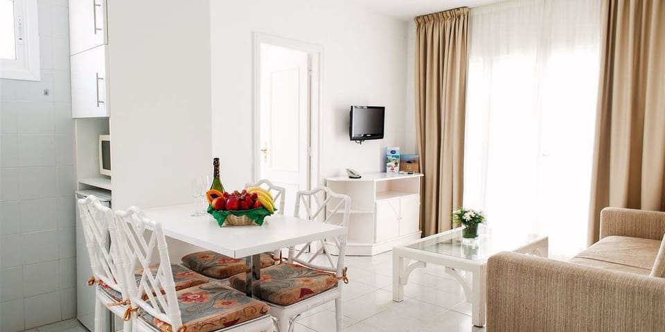 Standard Apartment | Living area | 32-inch LCD TV with satellite channels, TV