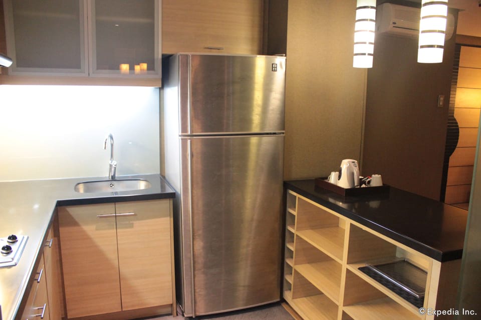 Penthouse Suite | Private kitchen | Fridge, coffee/tea maker