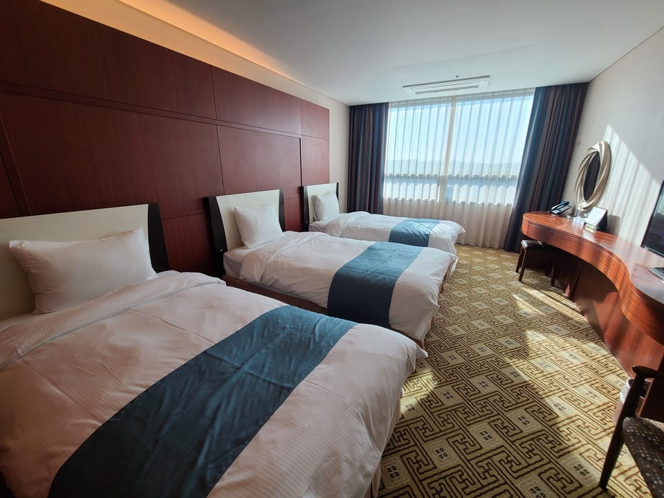 Triple (3 Single bed) | Premium bedding, individually furnished, desk, blackout drapes