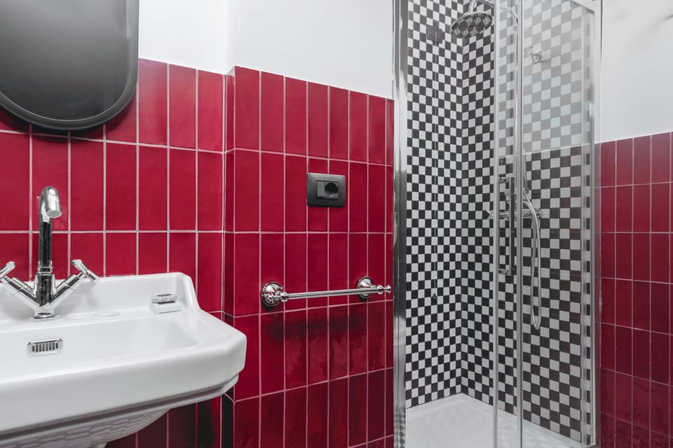 Shower, hair dryer, slippers, towels