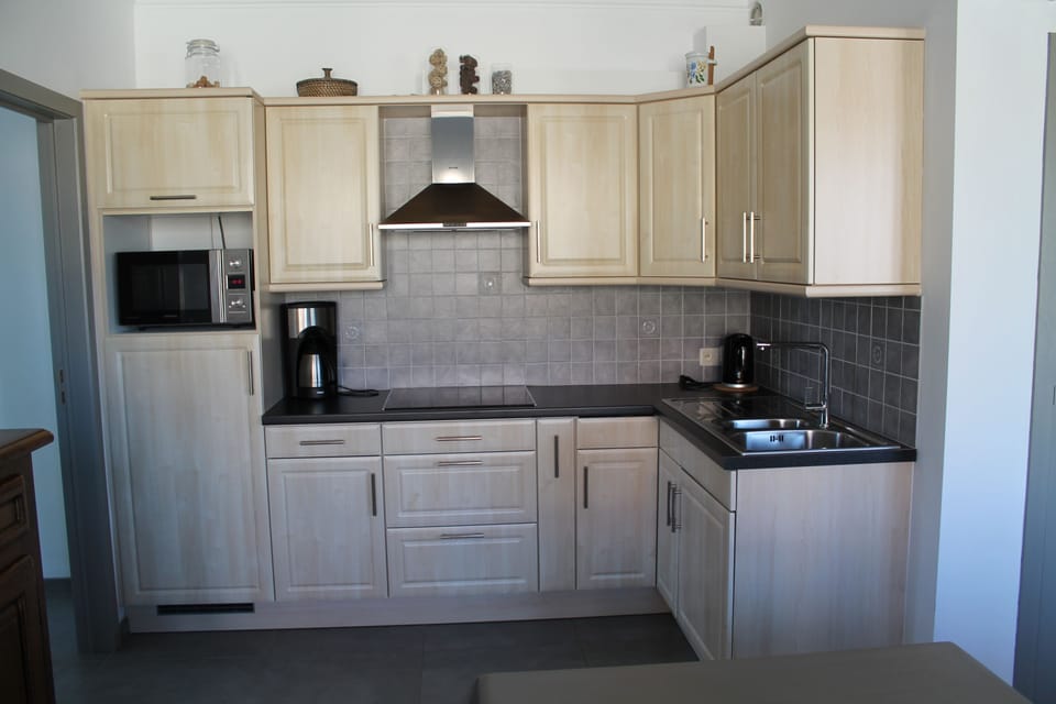 Family Apartment, 2 Bedrooms, Non Smoking, Corner | Private kitchen | Fridge, microwave, coffee/tea maker, electric kettle