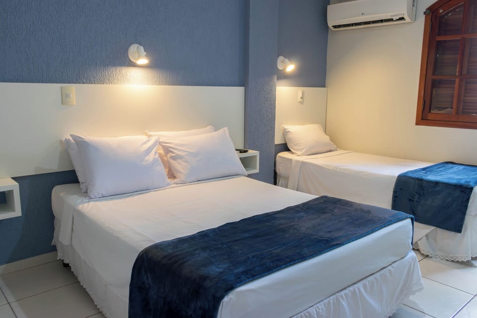 Triple Room | Minibar, free WiFi, bed sheets