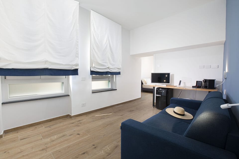 Family Suite, Terrace, City View | Living area | 40-inch flat-screen TV with digital channels, TV