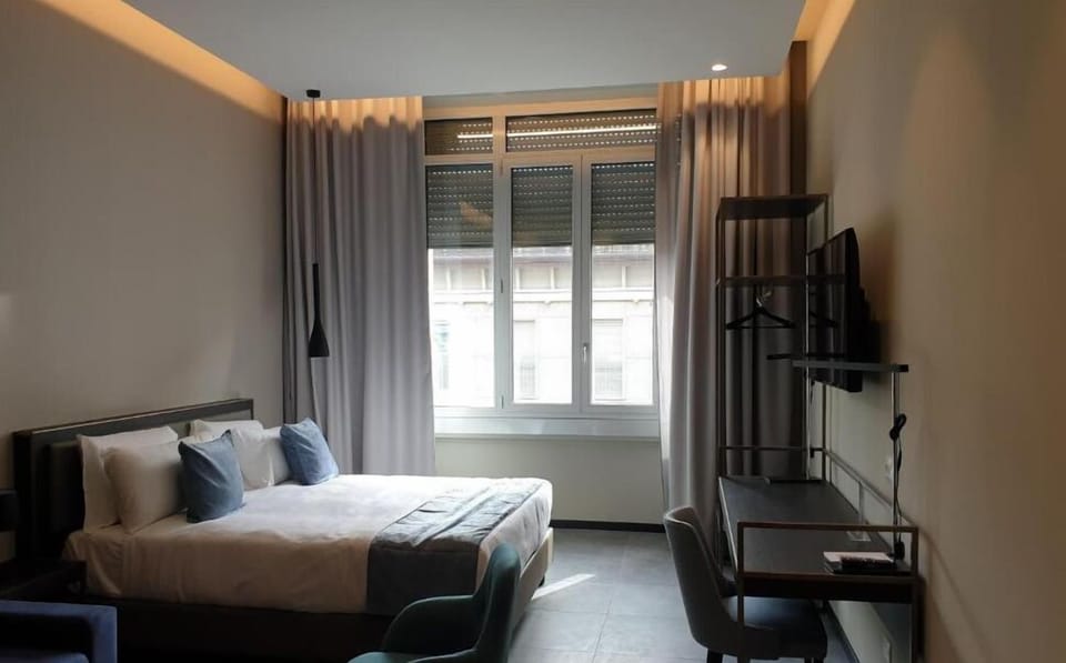 Deluxe Double Room | Down comforters, minibar, in-room safe, desk