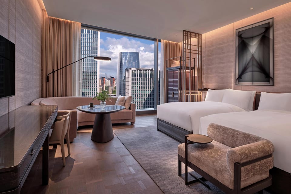 Executive Room, 2 Twin Beds | Living area | 55-inch TV with cable channels