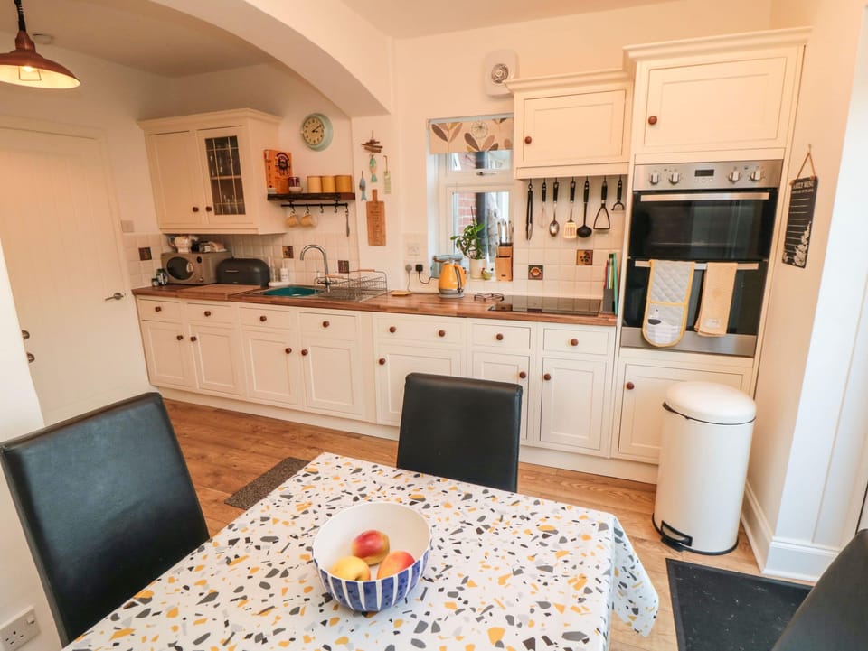 Fridge, electric kettle, toaster, cookware/dishes/utensils