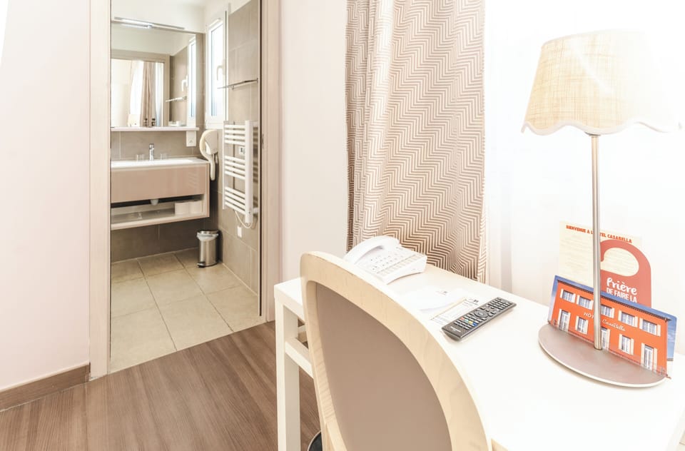 Standard Double Room | Minibar, in-room safe, individually decorated, desk