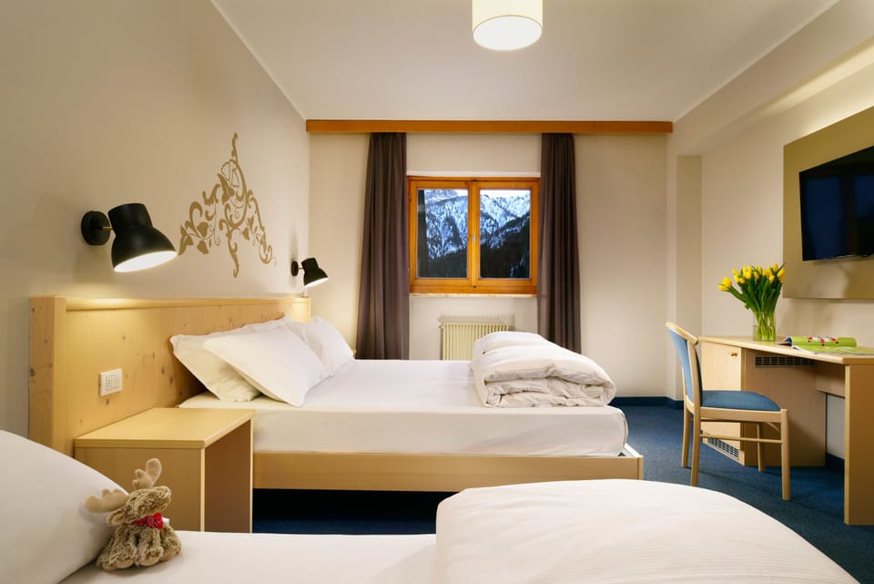Standard Triple Room | Down comforters, in-room safe, desk, bed sheets