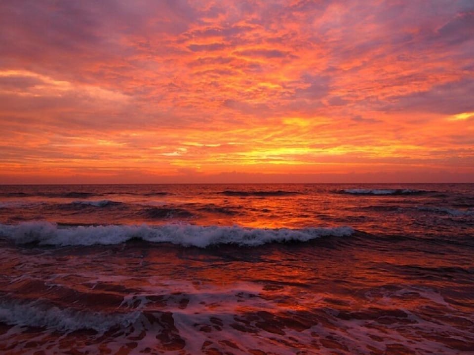 On the beach, sun loungers, beach umbrellas, beach towels