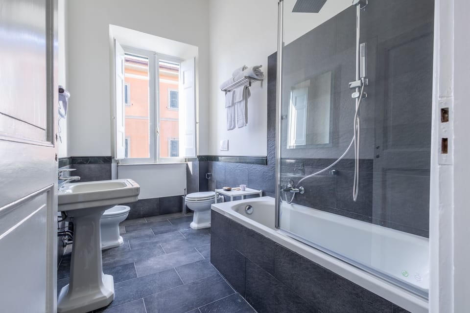 Room | Bathroom | Rainfall showerhead, free toiletries, bathrobes, towels