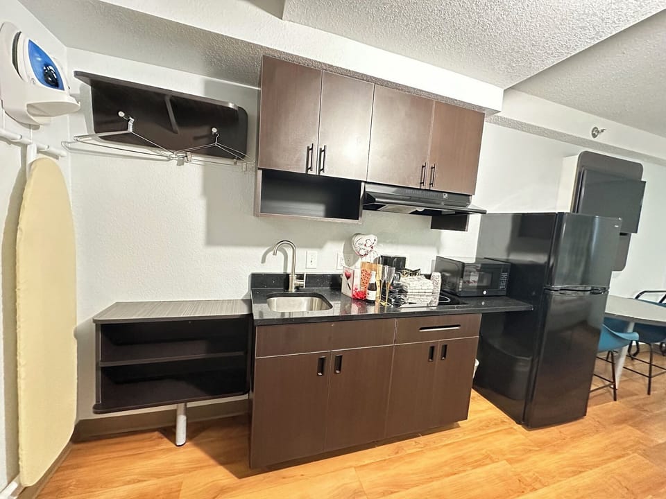 Desk, blackout drapes, WiFi (free), bed sheets