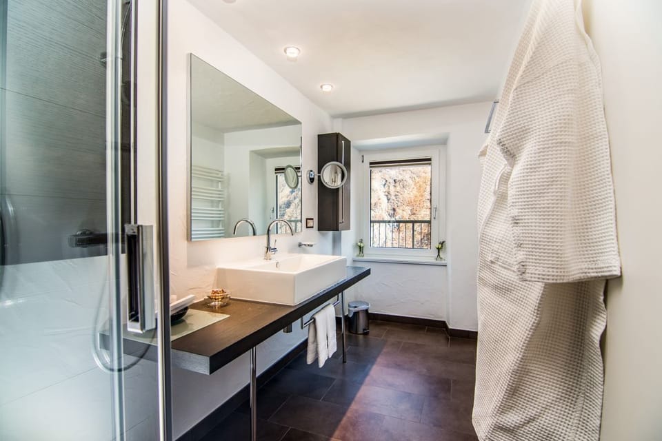 Panoramic Double Room | Bathroom | Deep soaking tub, free toiletries, hair dryer, bathrobes