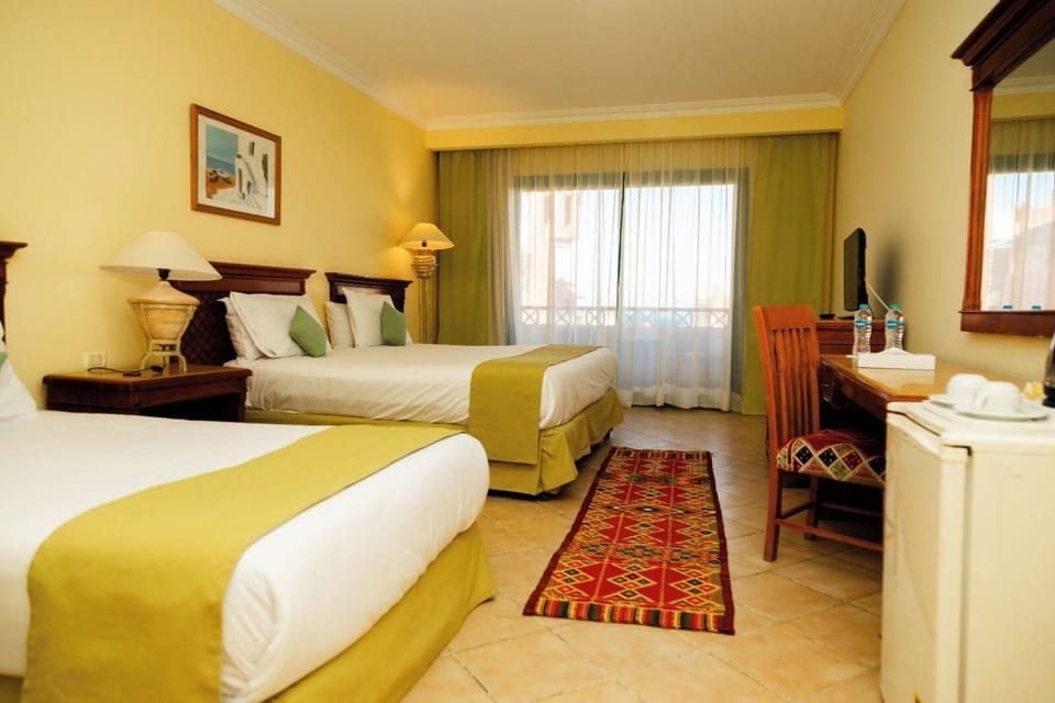 Premium bedding, minibar, blackout drapes, bed sheets