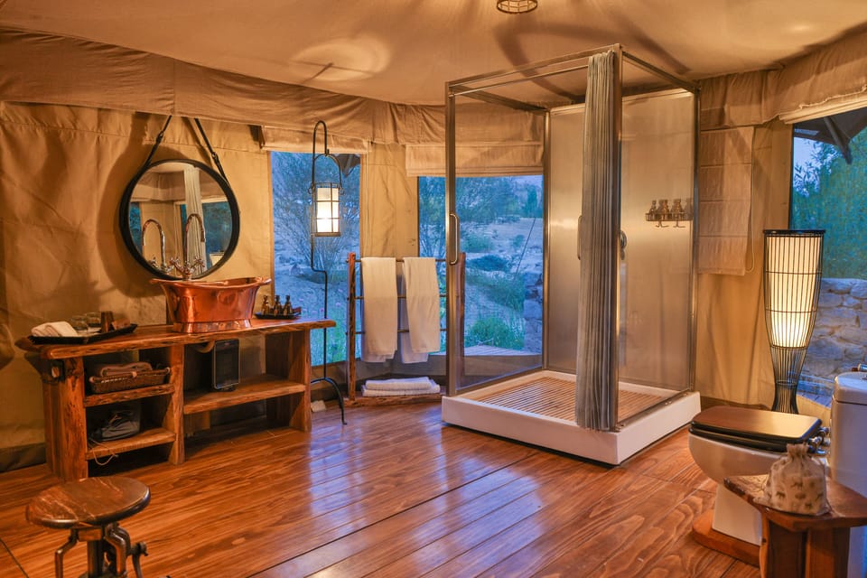 Presidential Tent, Patio (Suite) | Bathroom | Shower, rainfall showerhead, designer toiletries, hair dryer