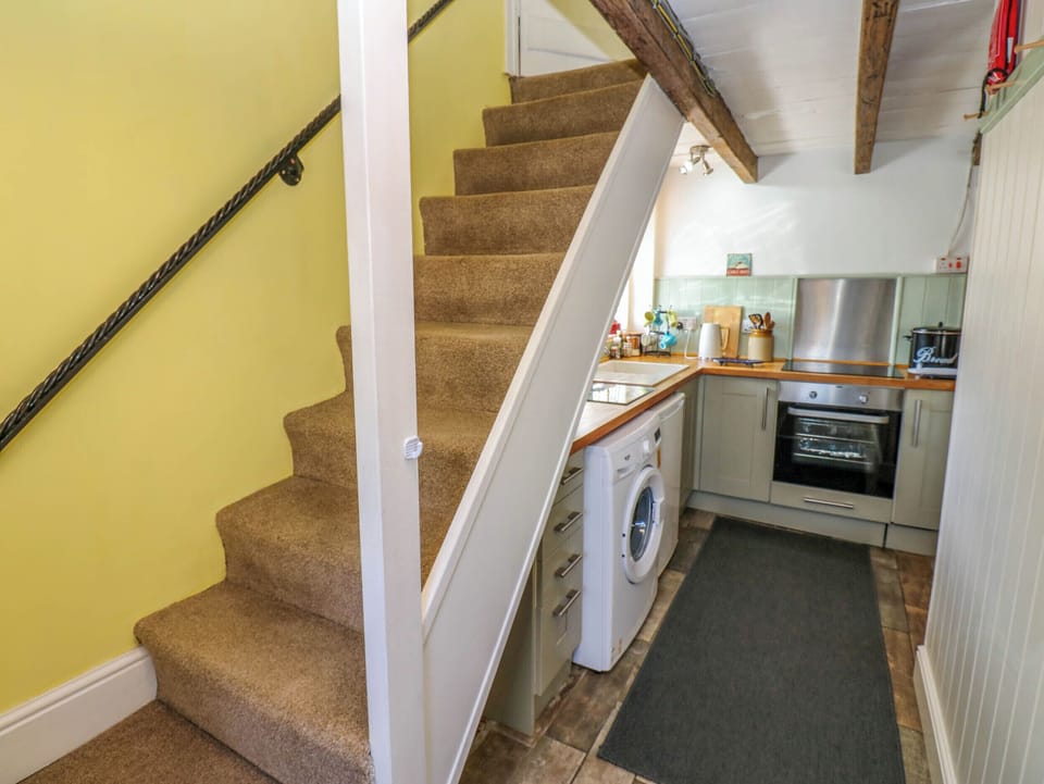 Fridge, electric kettle, toaster, cookware/dishes/utensils