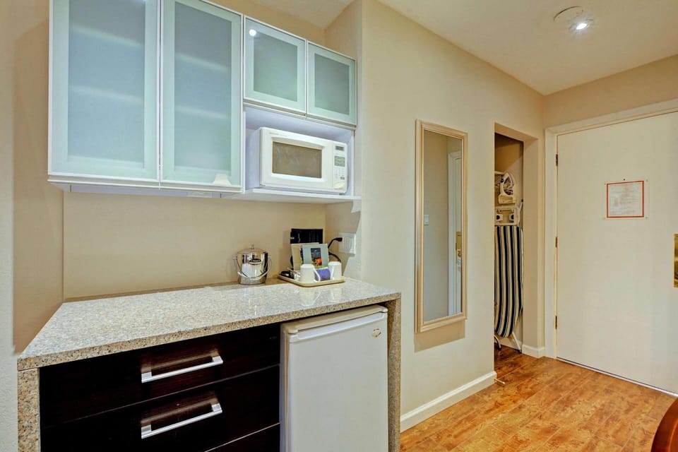 Fridge, microwave, cookware/dishes/utensils